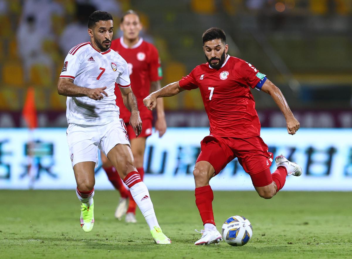 Source of Joy: Hassan Maatouk of Lebanon, the country’s leading goalscorer, battles for control of the ball against Ali Mabkhout of the UAE during a FIFA World Cup 2022 Qualifier match at Zabeel Stadium, Dubai, on September 2, 2021.