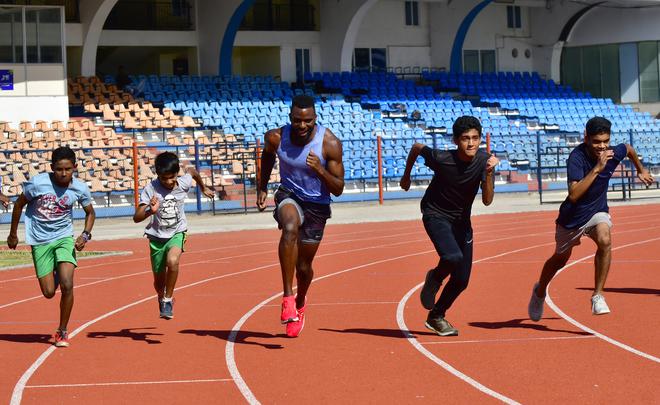 A few athletes at the Sree Kanteerava Stadium worked up the courage to ask Bednarek to run with them and he generously obliged. 