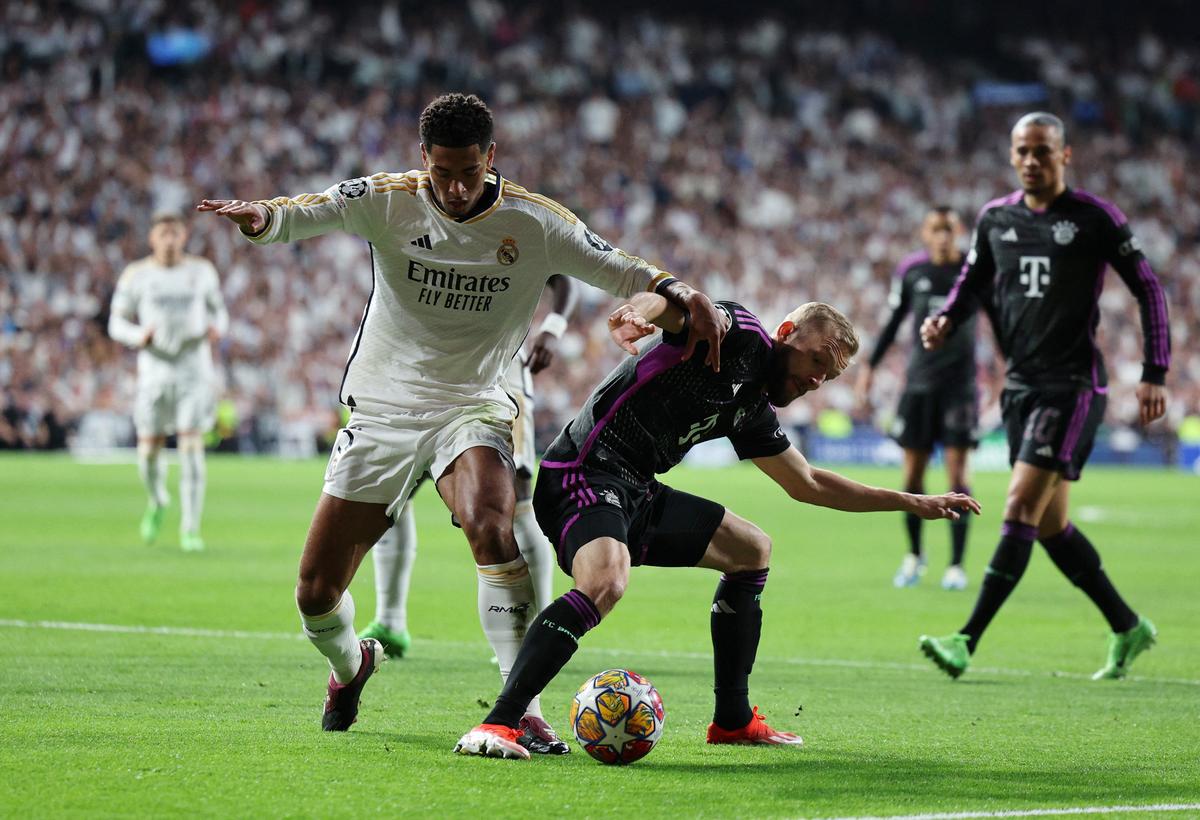 Real Madrid’s Jude Bellingham in action with Bayern Munich’s Konrad Laimer during the UCL semifinal.