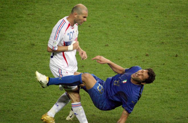 French midfielder Zinedine Zidane (L) head-butting Italian defender Marco Materazzi during the World Cup 2006 final football match between Italy and France at the Olympic Stadium. 