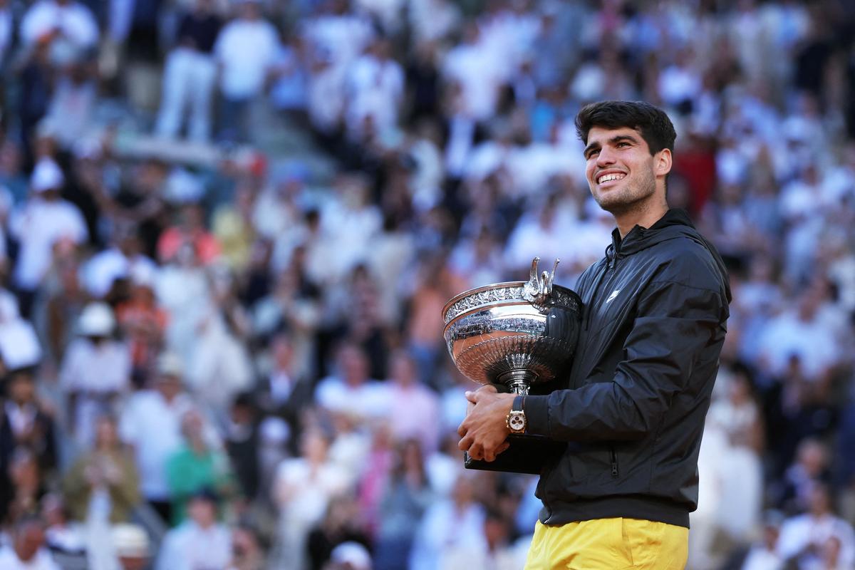 Carlos Alcaraz became the youngest man, at 21, to capture a Grand Slam title on hard, clay, and grass courts.