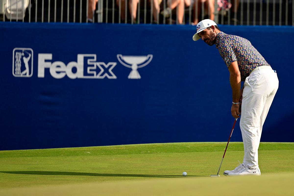 Billy Horschel of the United States putts on the 18th green during the third round of the Wyndham Championship.