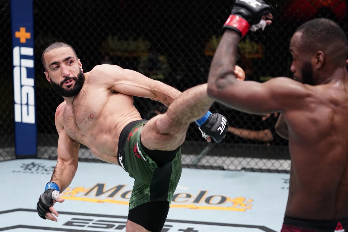 Champion slayer: Belal Muhammad (left) closed out the show by wrestling the welterweight title away from home favourite Leon Edwards (right).