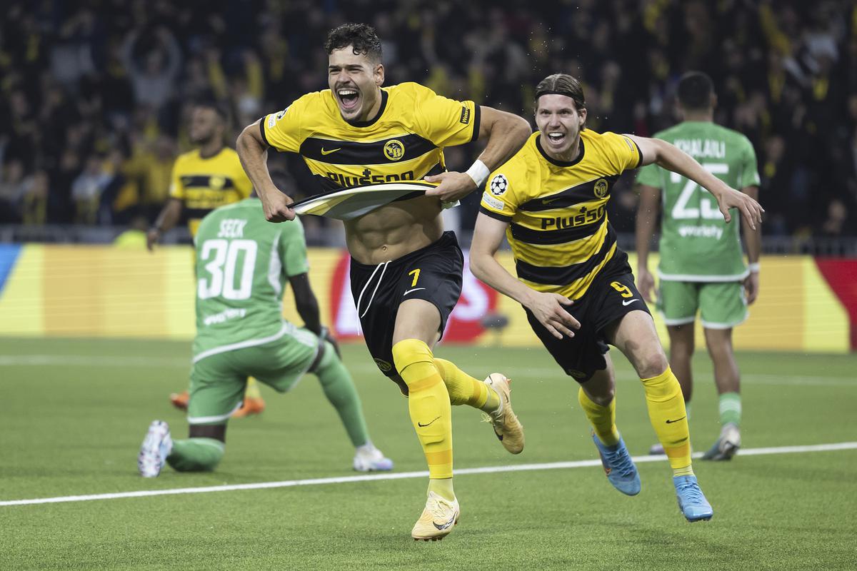 Young Boy’s Filip Ugrinic, front, celebrates after scoring his side’s third goal during the UEFA Champions League play-off 2nd leg match against Israel’s Maccabi Haifa.