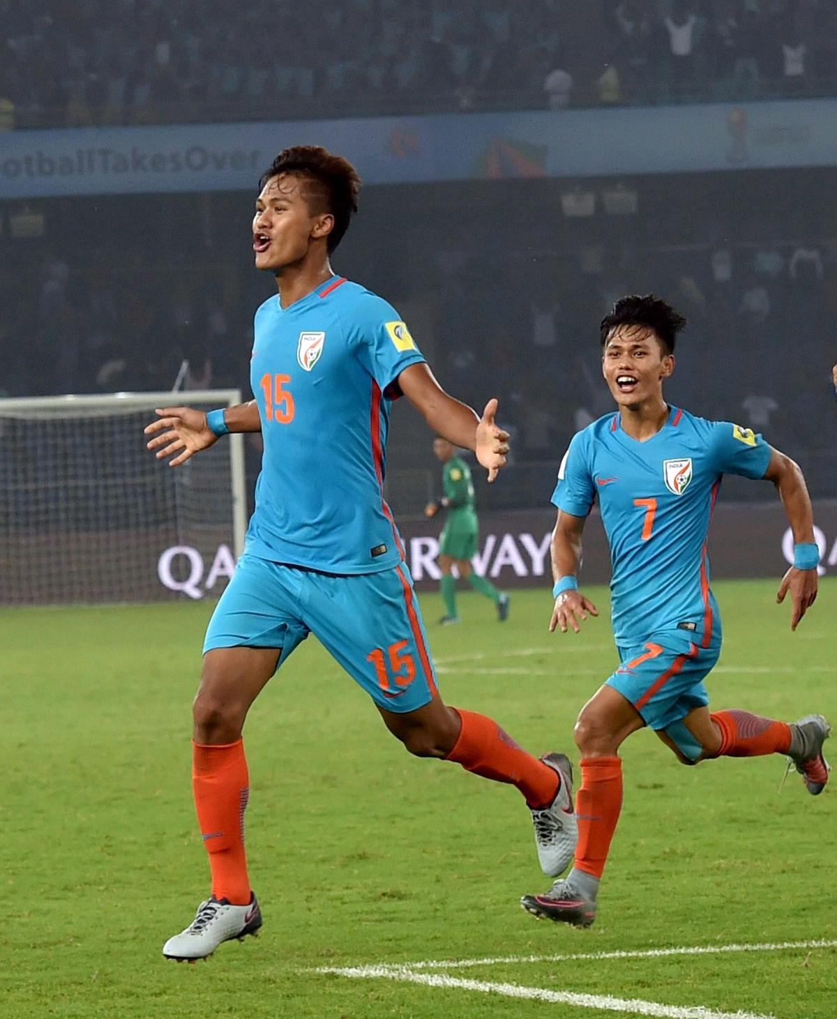 India’s Jeakson Thounaojam (15) celebrates  after scoring India’s first goal during  the FIFA U-17 World Cup 2017 football match against Colombia  in New Delhi.