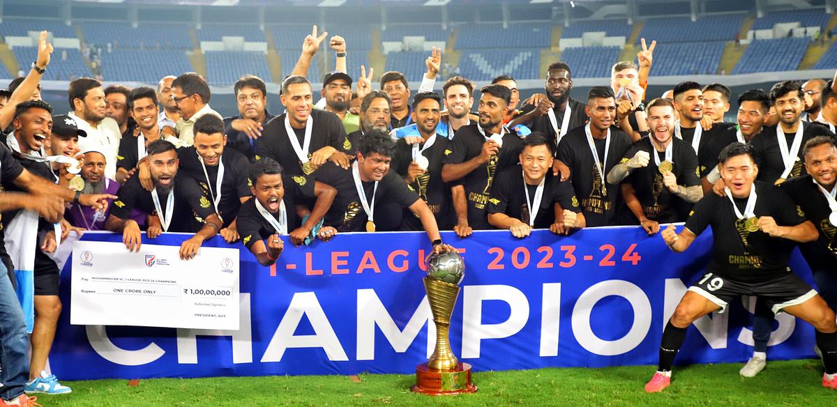 Mohammedan Sporting Team celebrates winning the I-League 2023-24 at the Salt Lake Stadium in Kolkata.