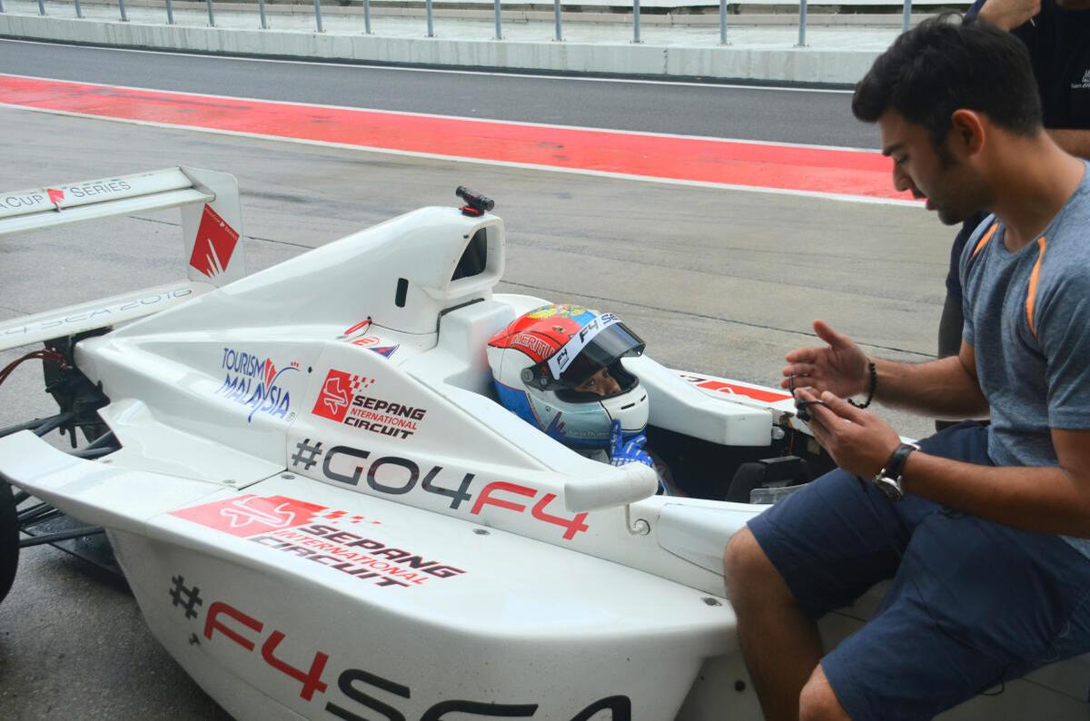 FILE PHOTO: India’s racing star Armaan Ebrahim giving tips to Mira Erda of Vadodara in 2017. 