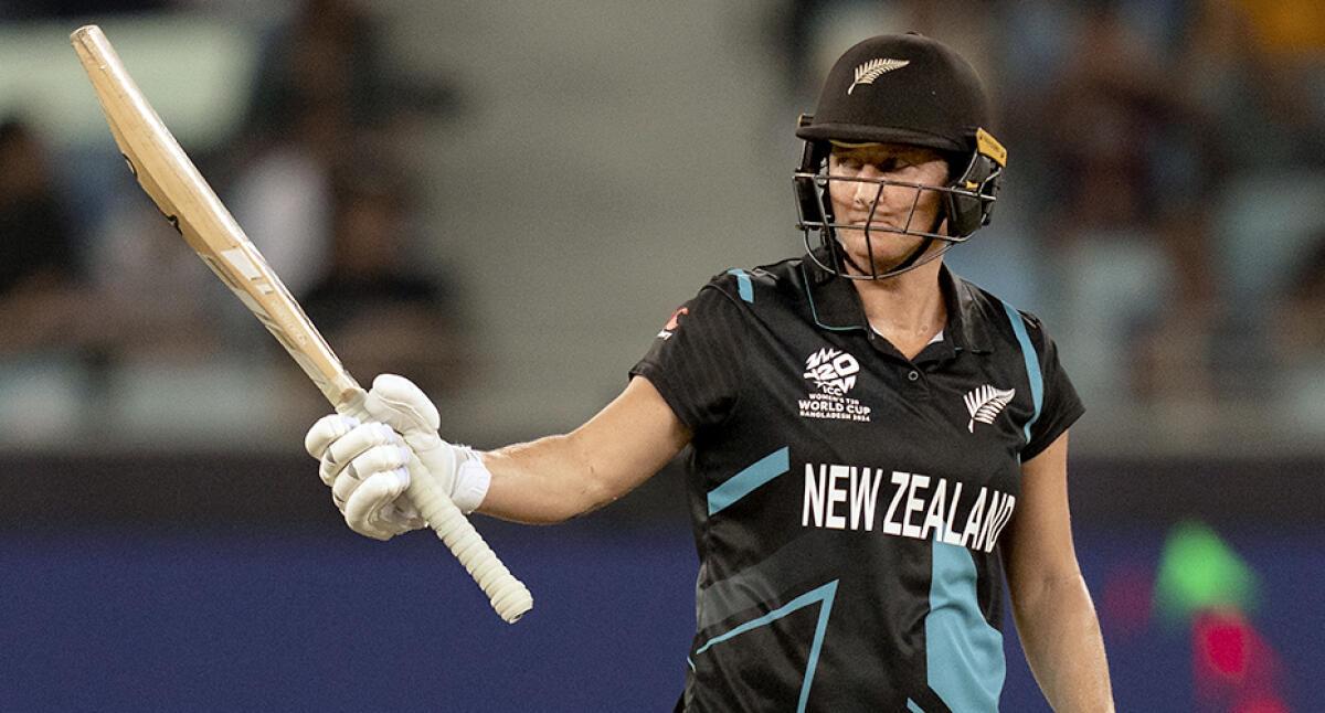 New Zealand’s captain Sophie Devine celebrates her fifty. 