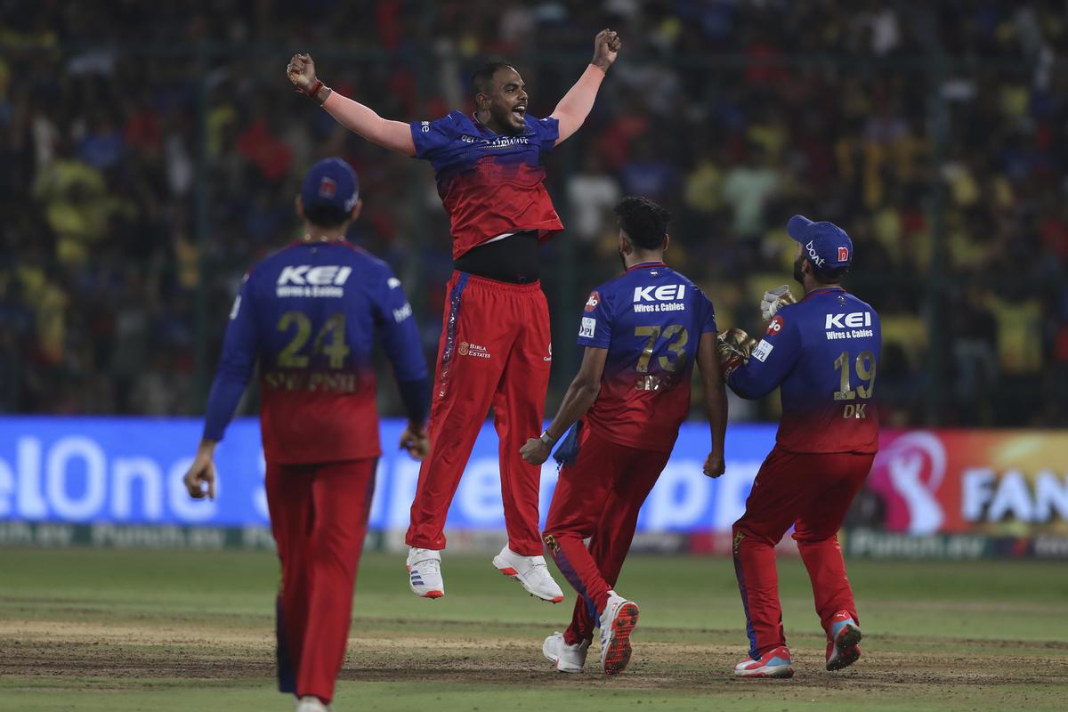 Royal Challengers Bengaluru’s Yash Dayal, second left, celebrates with teammates after their win in the Indian Premier League cricket match against Chennai Super Kings. 