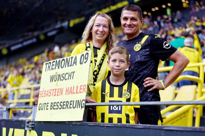 A fan favourite: Dortmund fans show a banner to support Sebastien Haller to get healthy during the season opening of Borussia Dortmund at Signal Iduna Park.