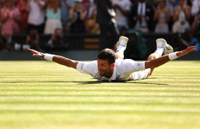 Djokovic celebrates after winning the men’s singles in Wimbledon against Nick Kyrgios.