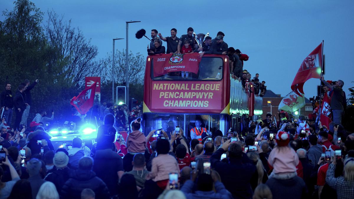 Wrexham paints town red with open-top bus parade after promotion to EFL