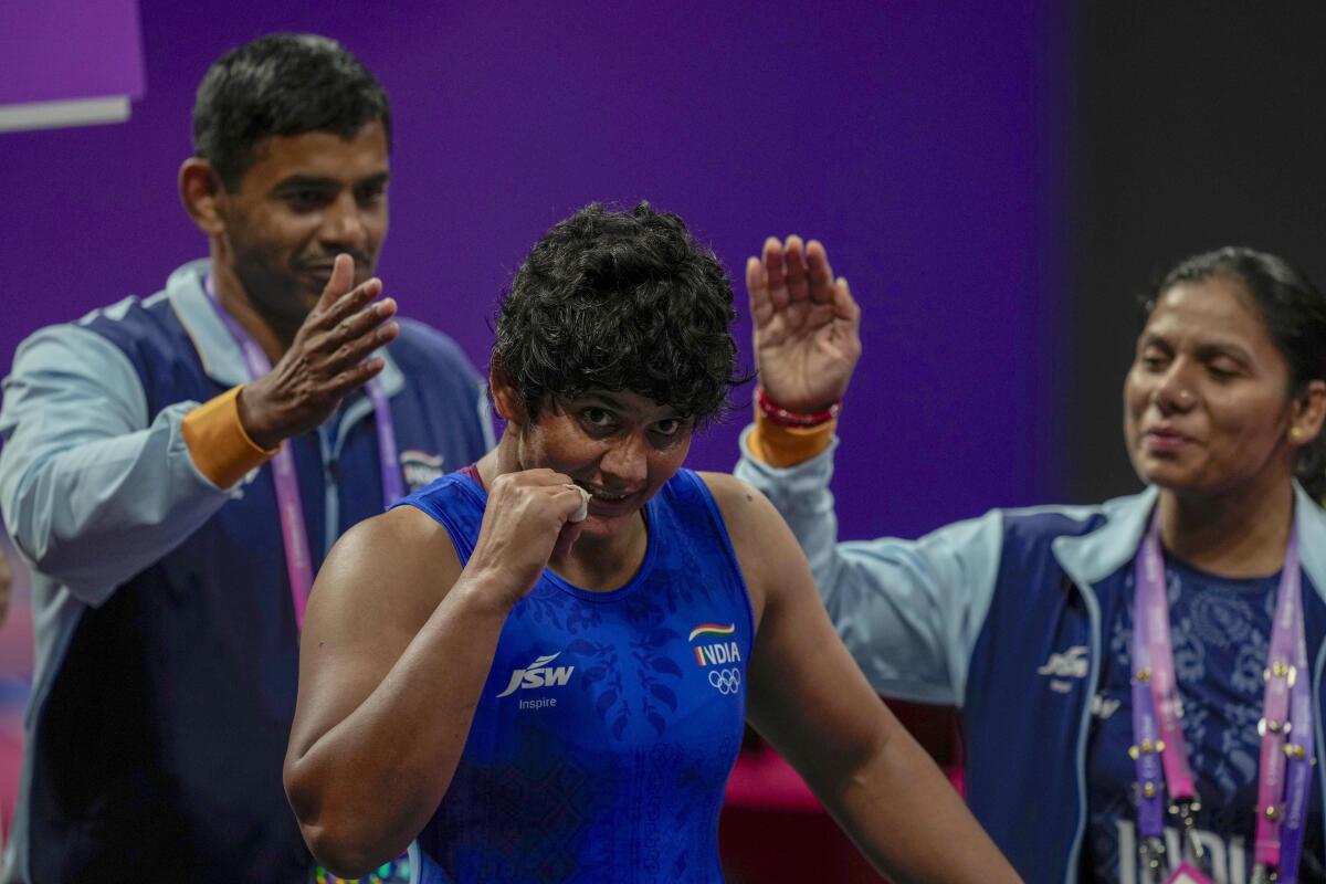 Primed for the podium: Kiran after winning the bronze medal in the women’s freestyle 76kg category.