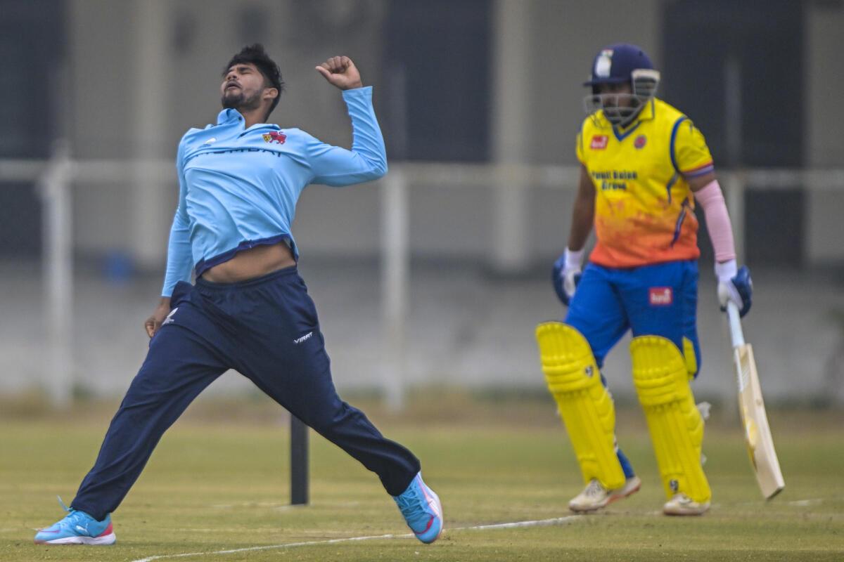 Mumbai’s Musheer Khan celebrates the wicket of Maharashtra’s Prithvi Shaw. 