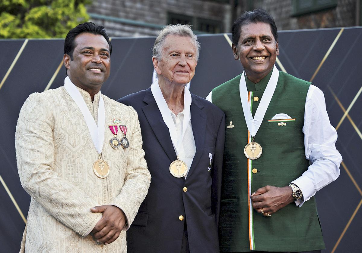 From left to right: Leander Paes, Richard Evans and Vijay Amritraj pose for a photo after getting inducted into the International Tennis Hall of Fame in Newport, Rhode Island, US, on July 20, 2024. 