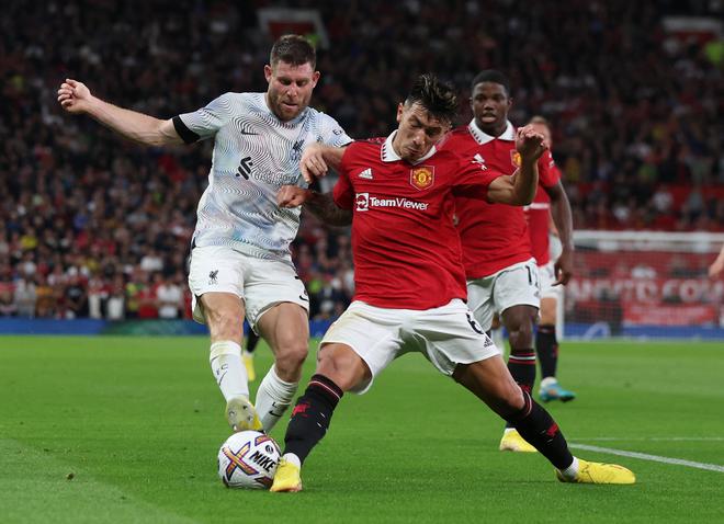 Manchester United’s Lisandro Martinez in action against James Milner of Liverpool at Old Trafford.