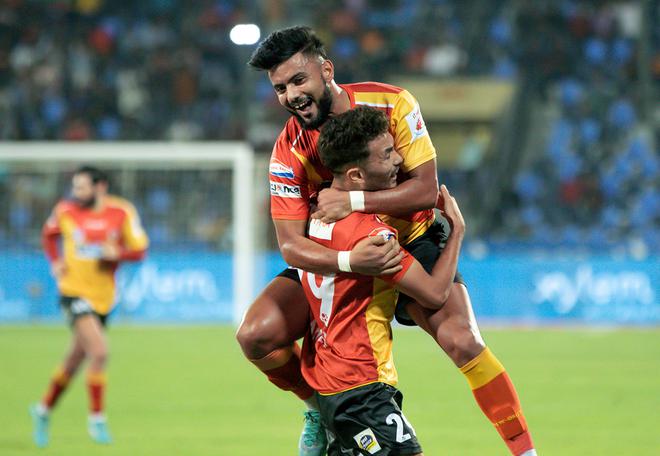 Naorem Mahesh Singh of East Bengal FC and Mohammad Mobashir Rahman of East Bengal FC celebrates a goal against Mumbai City FC. 