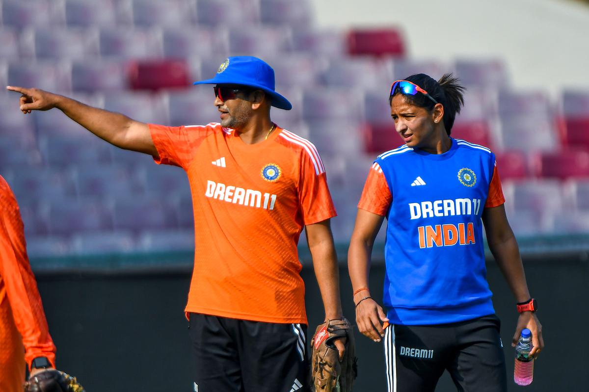 Harmanpreet Kaur and Coach Amol Muzumdar during the practice session ahead of India Vs England Test match. 