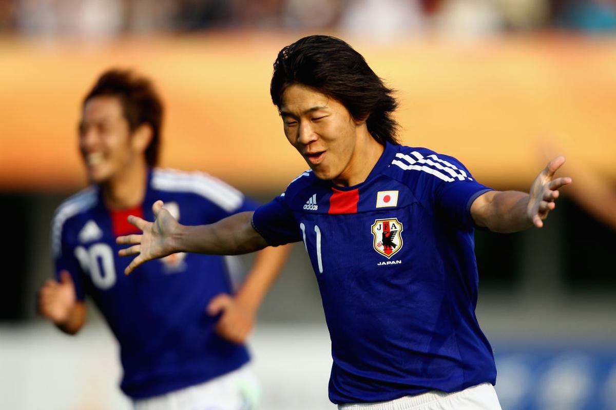 Kensuke Nagai of Japan celebrates scoring the first goal against India in the round of 16 match of the Asian Games 2010 in Guangzhou, China.