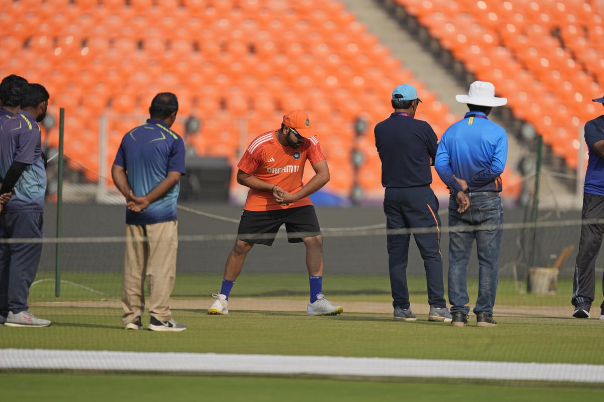 Rohit Sharma assesses the pitch at the Narendra Modi Stadium during India’s optional training session on Friday.