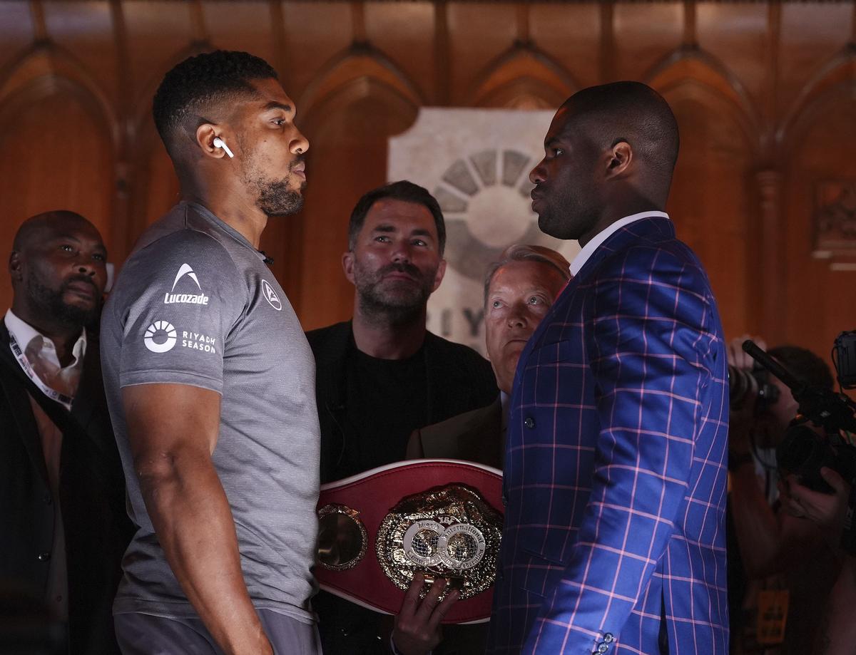 Anthony Joshua (left) and Daniel Dubois face off during a press conference during a press conference at the Guildhall, London, Thursday Sept. 19, 2024. The IBF heavyweight title fight between Anthony Joshua and Daniel Dubois will take place on Saturday 21st September.