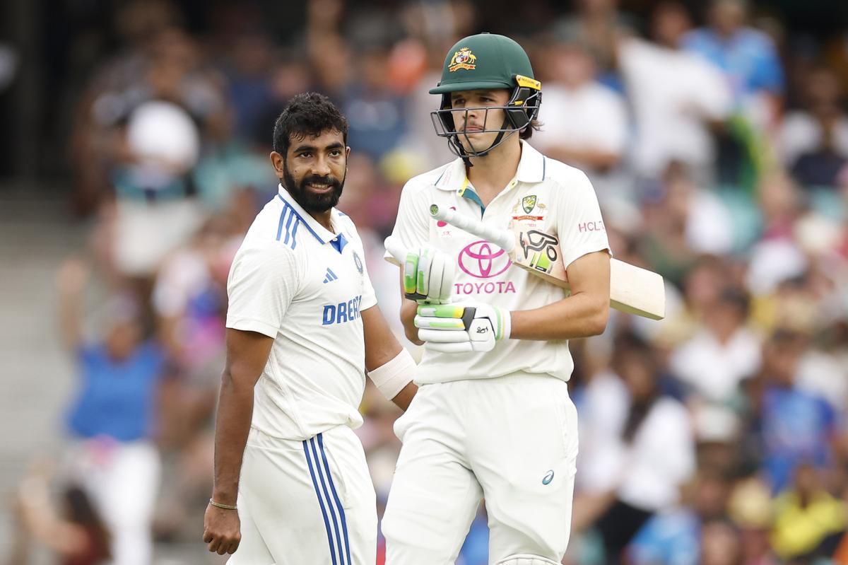 Jasprit Bumrah gestures towards Sam Konstas. 