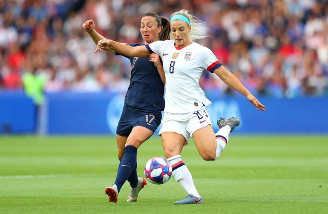 Julie Ertz battles for possession with Gaetane Thiney of France during the 2019 FIFA Women’s World Cup quarterfinal. 
