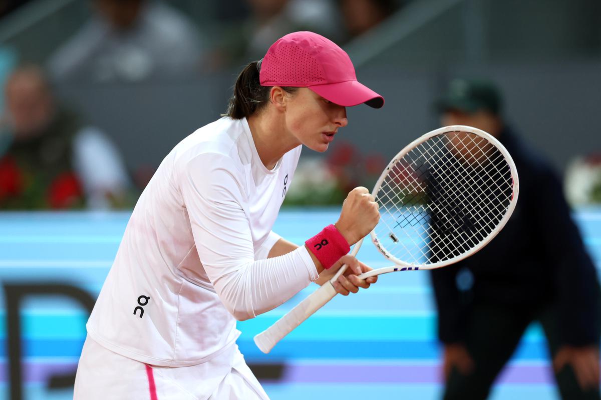 Iga Swiatek of Poland celebrates a point against Sorana Cirstea of Romania during the Women’s Singles fourth-round match of the Mutua Madrid Open at La Caja Magica.