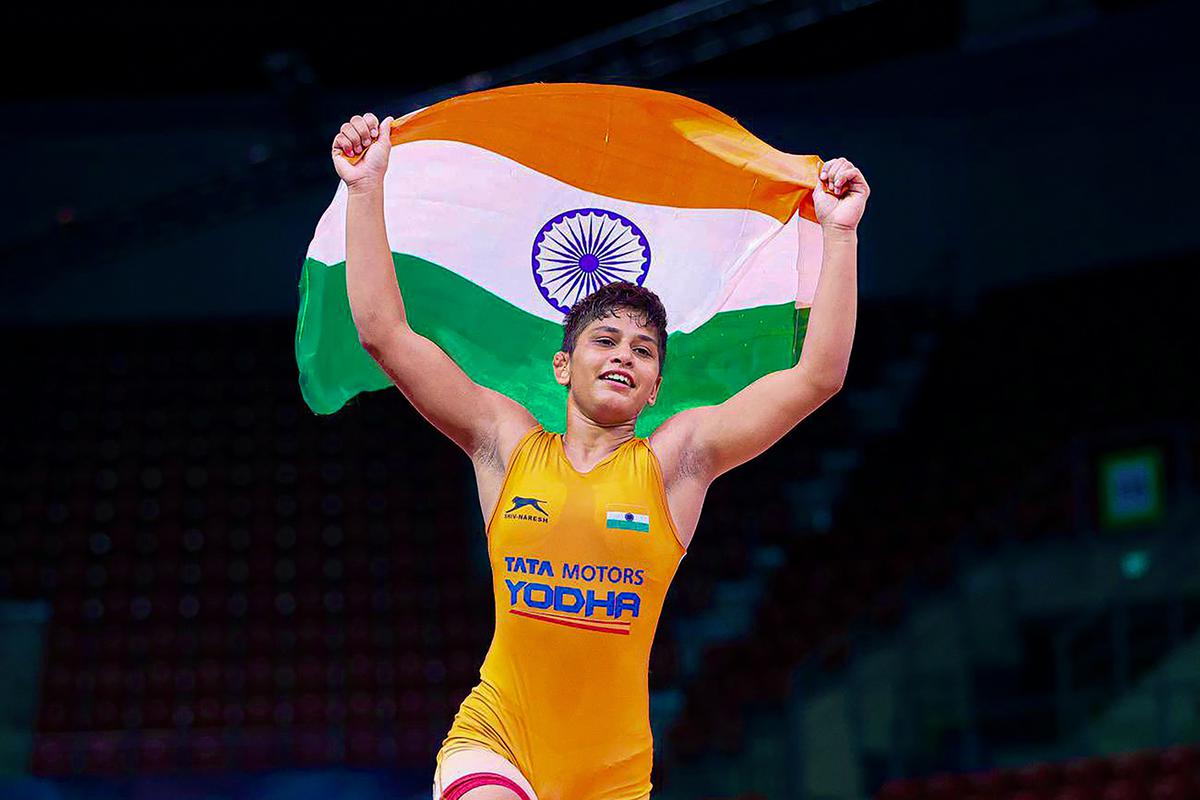 Wrestler Antim Panghal celebrates after winning a gold medal at the U-20 World Championships, in Sofia, Bulgaria. 