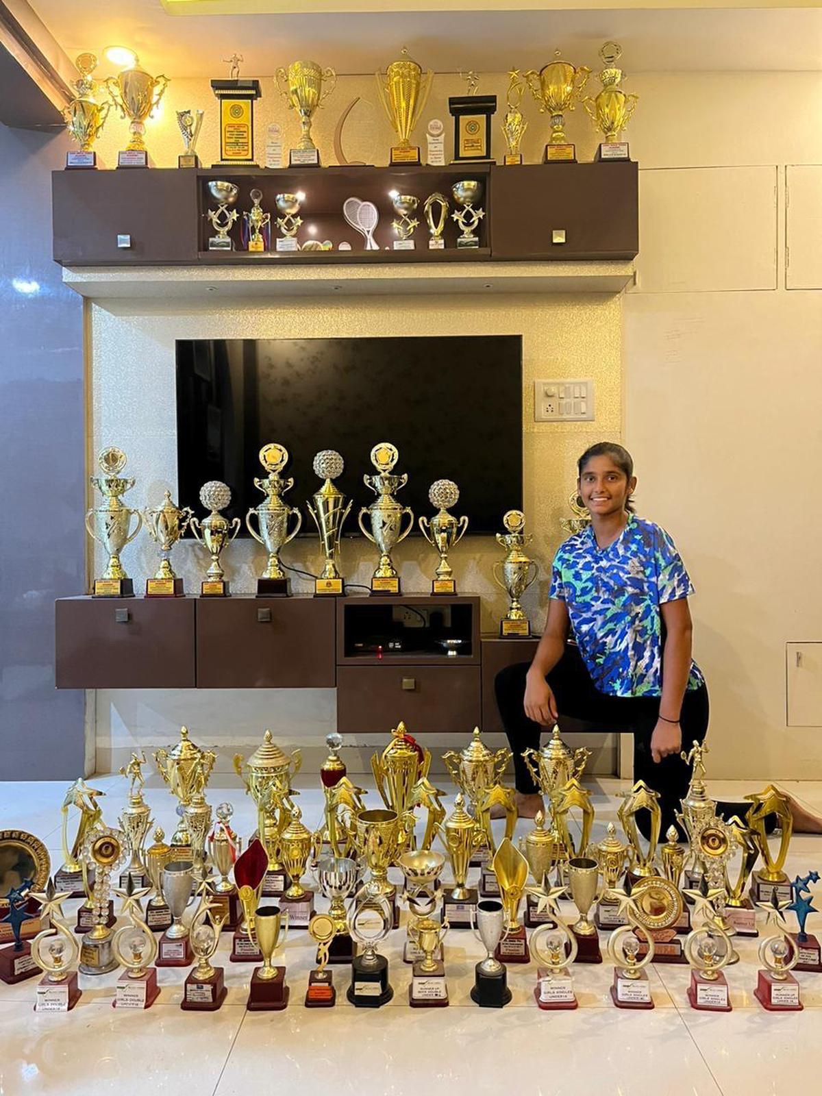 Tennis player D. Laxmi Siri, India’s No. 2 in the under-18 category, with her rich collection of trophies. 