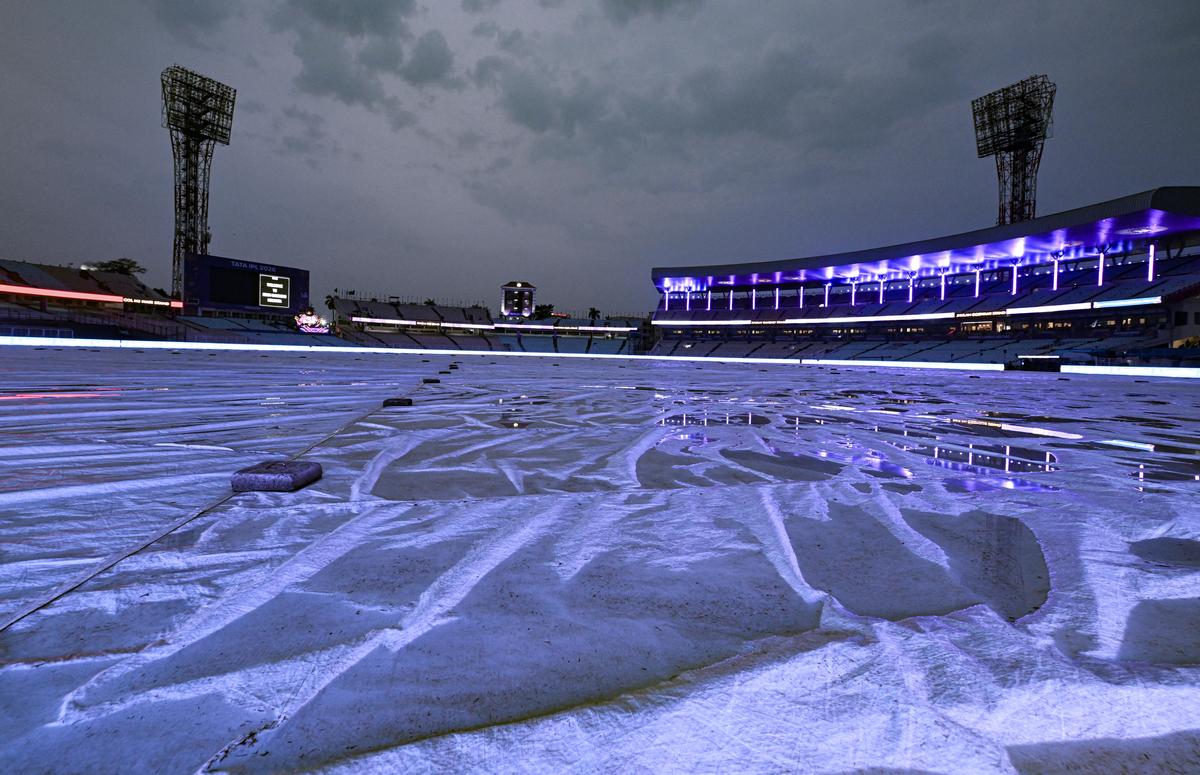 The Eden Gardens was under covers on the match eve due to rain and the forecasts predict more showers on Monday.