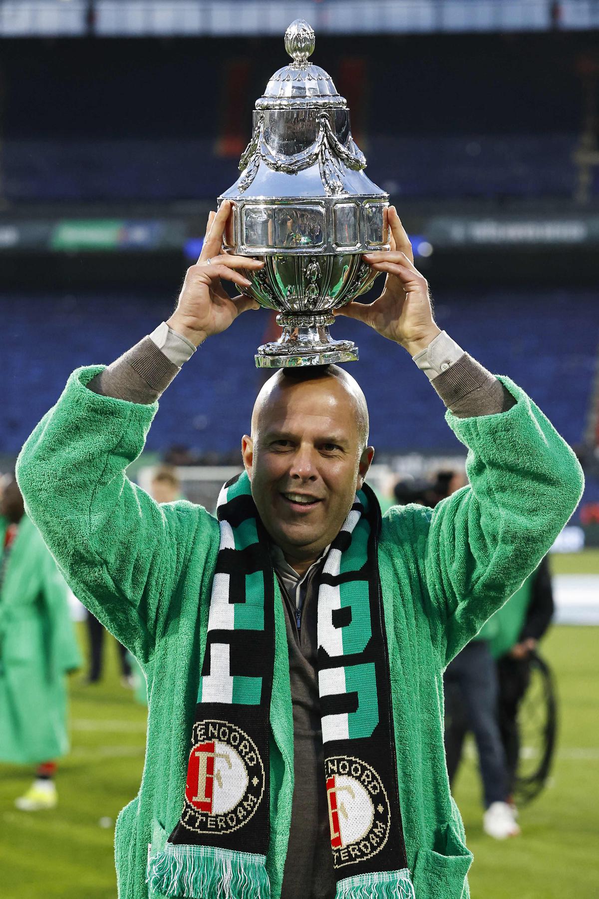 Feyenoord’s Dutch head coach Arne Slot celebrates Feyenoord’s victory in the Dutch KNVB Cup Final match between Feyenoord and NEC Nijmegen at Feyenoord Stadium de Kuip in Rotterdam