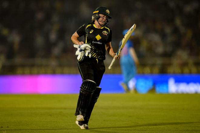 Australia’s Alyssa Healy walks back to the pavilion after an injury during the fourth women’s T20 cricket. 