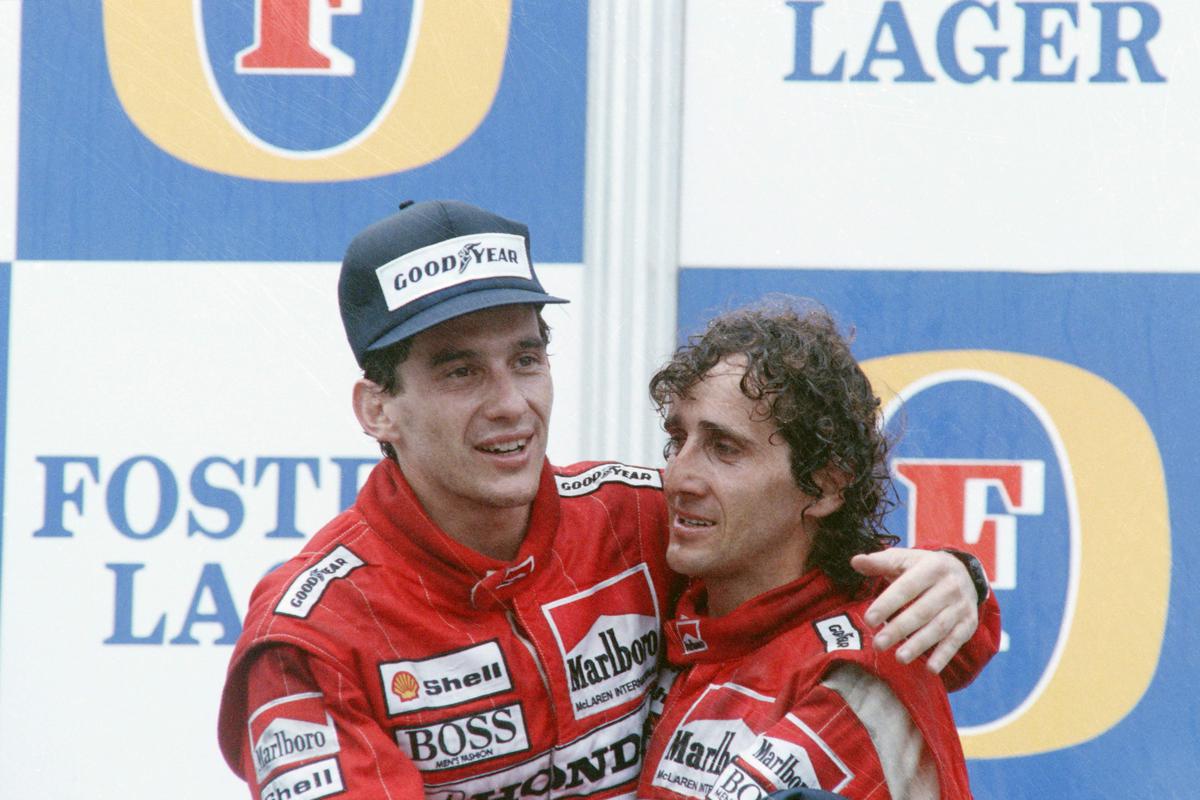 FILE PHOTO: Ayrton Senna (L) of Brazil embraces his team mate and winner of Australian Grand Prix Alain Prost of France.