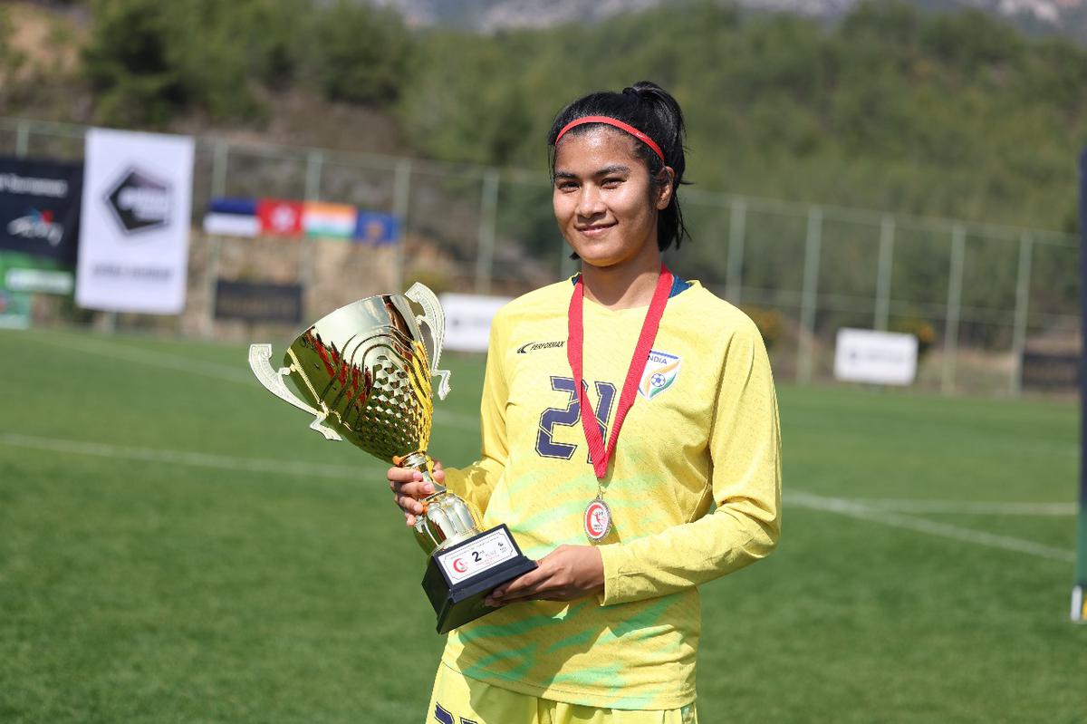 Pathoi Chanu with the runner-up trophy at the Turkish Women’s Cup, where she pulled off notable performances against Hong Kong and Kosovo.