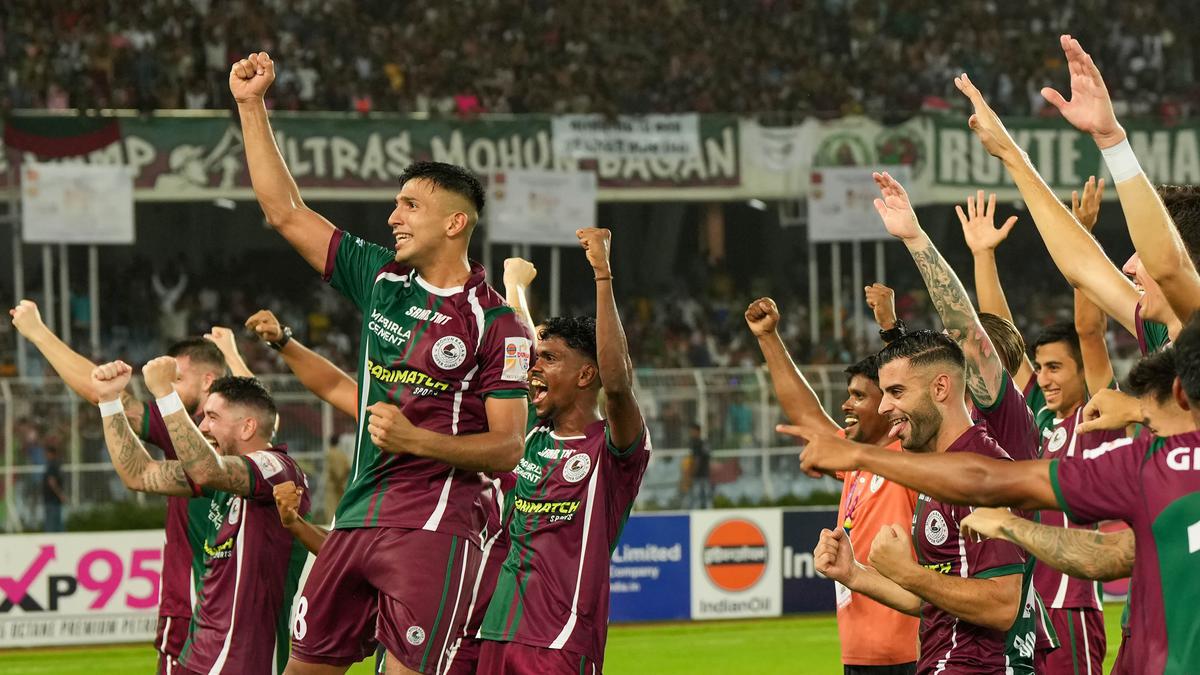 Mohun Bagan Super Giant players celebrate after winning the Durand Cup Final against East Bengal at the Salt Lake Stadium in Kolkata.