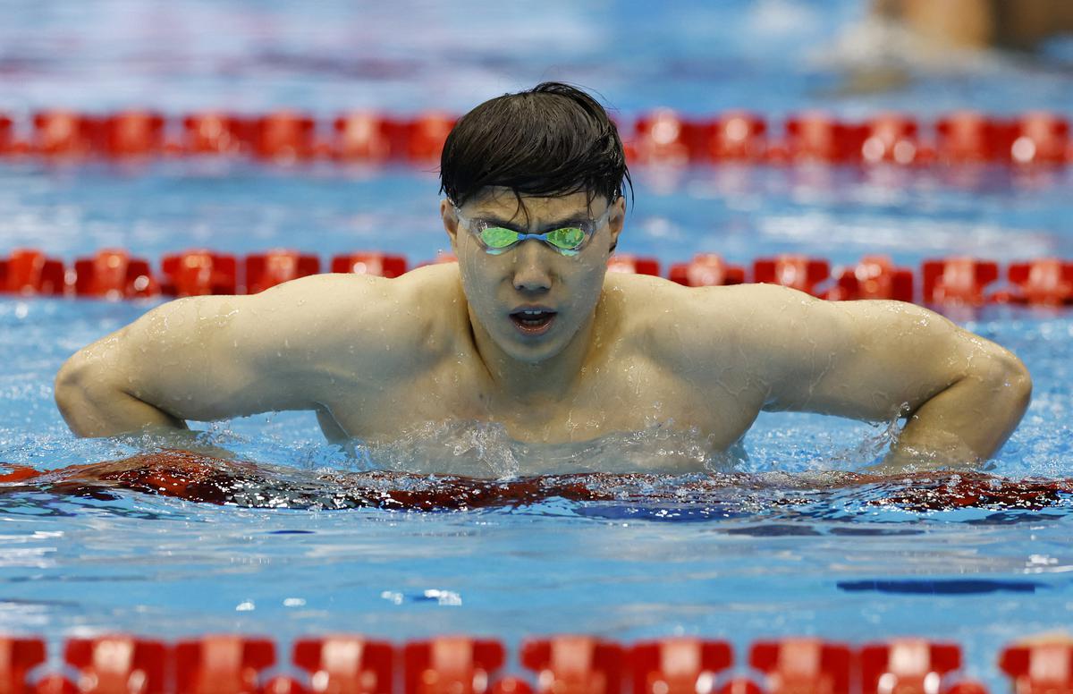 World Aquatics Championships Chinas Qin wins mens 100m breaststroke world title