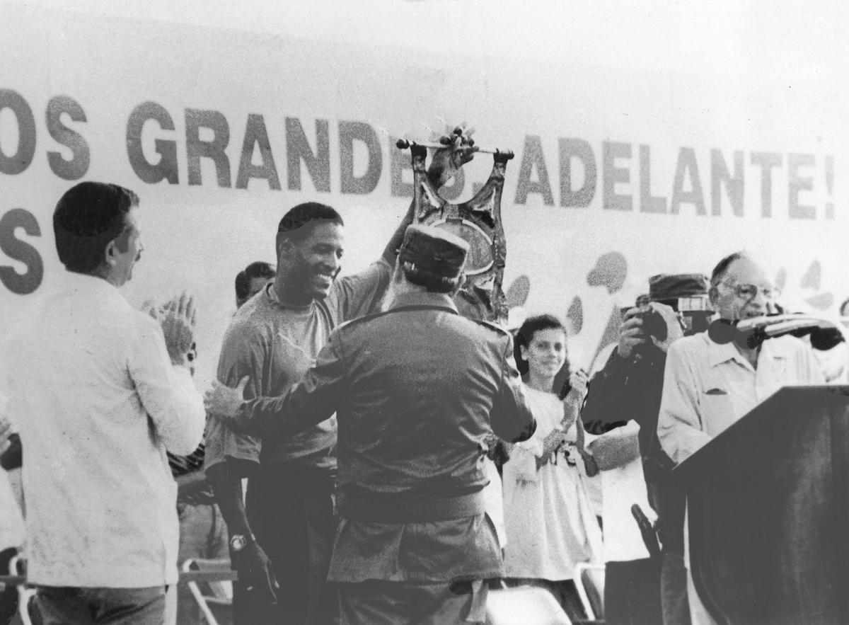 National icon: Cuban President Fidel Castro honours Javier Sotomayor, the nation’s most soaring symbol of excellence, whose world record of 2.45m was forged in an era when Cuban athletes were expected not just to medal, but to win.