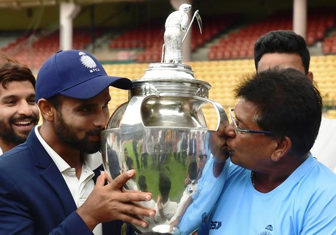 Kiss of success: Madhya Pradesh captain Aditya Shrivastava and head coach Chandrakant Pandit’s joy knew no bounds after the team won its first-ever Ranji title.