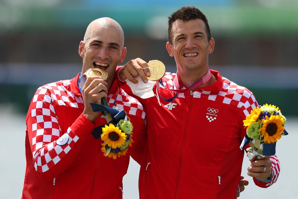 TOKYO, JAPAN - JULY 29:  Gold medalists Martin Sinkovic and Valent Sinkovic of Team Croatia pose with their medals during the medal ceremony for the Men's Pair Final A on day six of the Tokyo 2020 Olympic Games at Sea Forest Waterway on July 29, 2021 in Tokyo, Japan. (Photo by Naomi Baker/Getty Images)