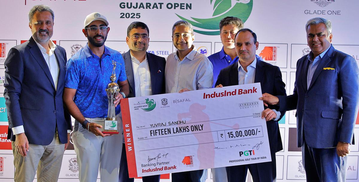 Gujarat Open champion Yuvraj Sandhu with the winner’s trophy.