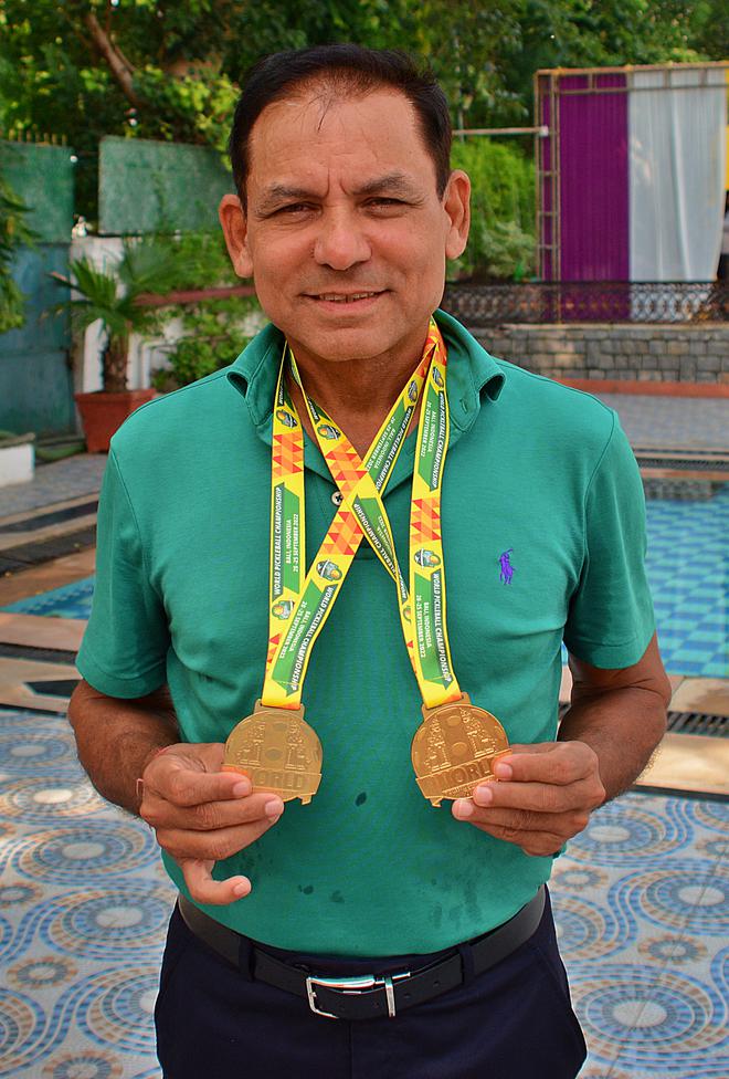 Ajeet Bhardwaj sports the two gold medals he won in the recent Pickleball World Championships in Bali before presenting them to the Vasant Vihar Club on Founder’s Day on Saturday.