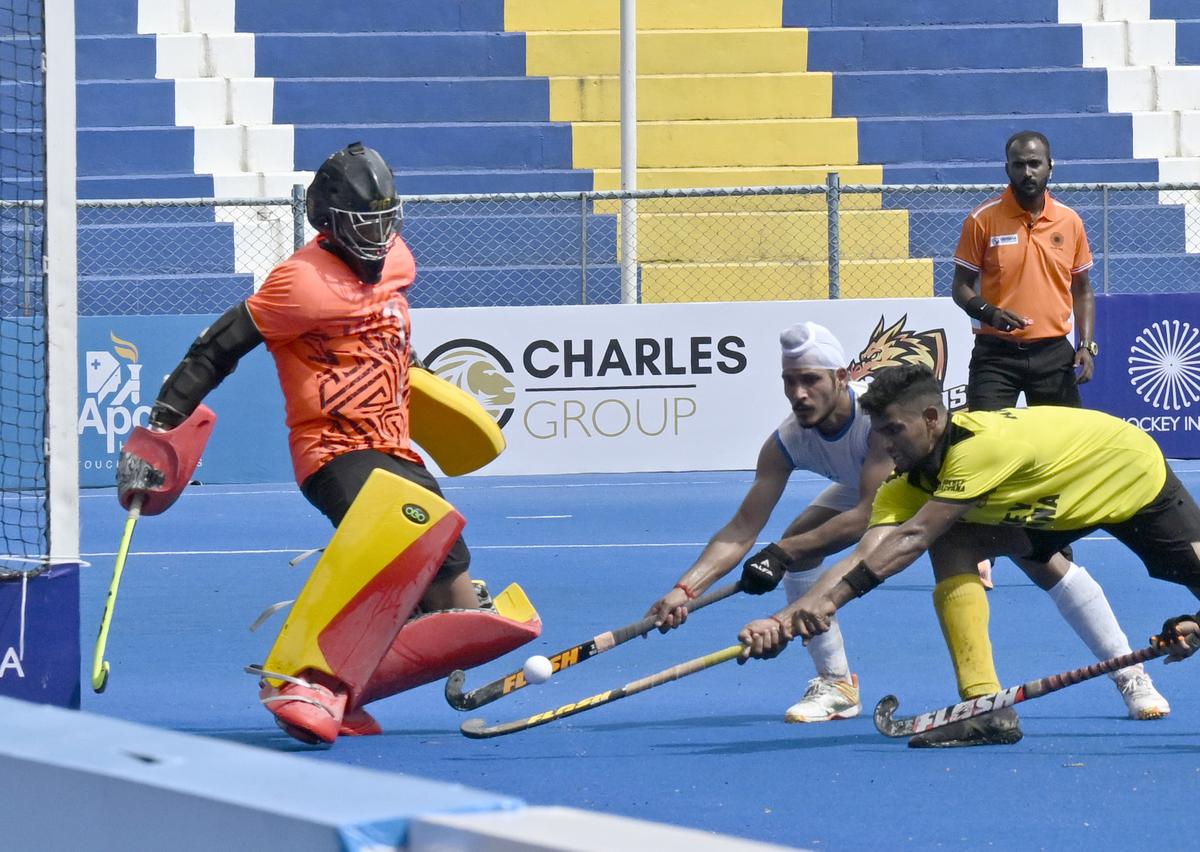 Haryana’s Rajant (yellow jersey) scores a goal against Himachal during the 14th Hockey India Senior Men National Championship at the Mayor Radhakrishnan Stadium in Chennai on Wednesday. 