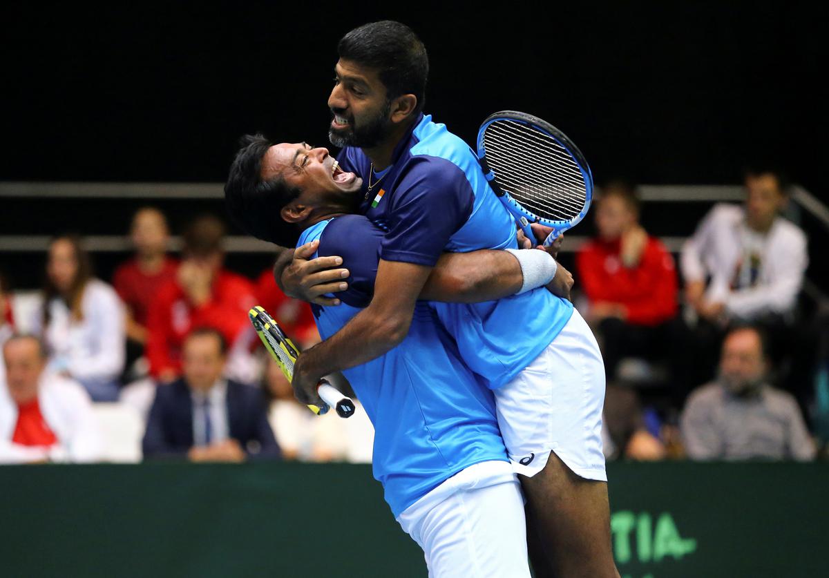 India’s Rohan Bopanna and Leander Paes celebrate after winning a Davis Cup match. 