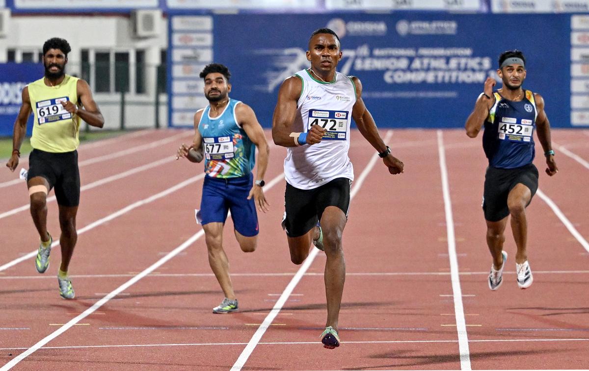 Animesh Kujur (2nd from right) of Odisha winning the men’s 200m final at the 27th National Federation Senior Athletics Competition, in Bhubaneswar.