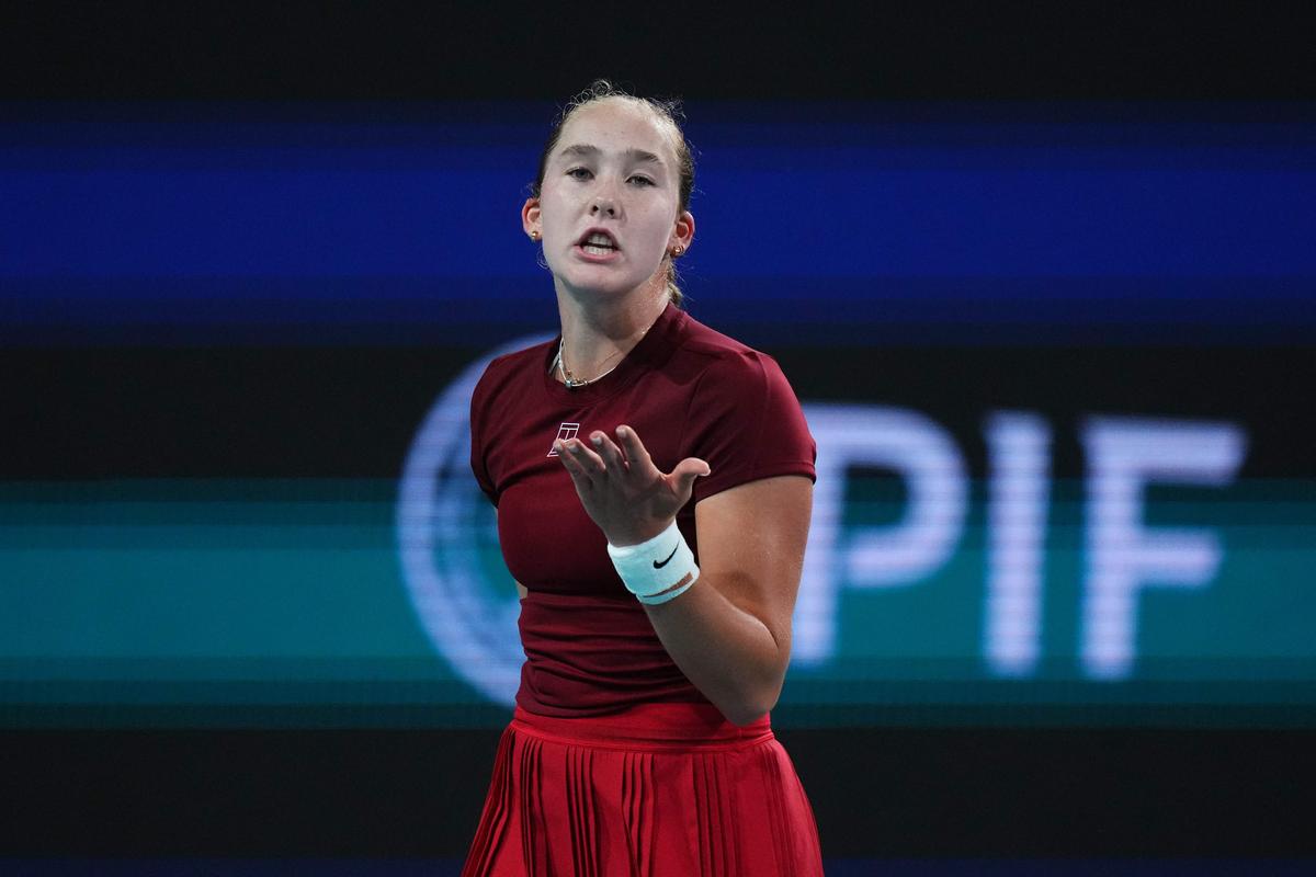 Mirra Andreeva reacts during her match against Amanda Anisimova in the Miami Open. 