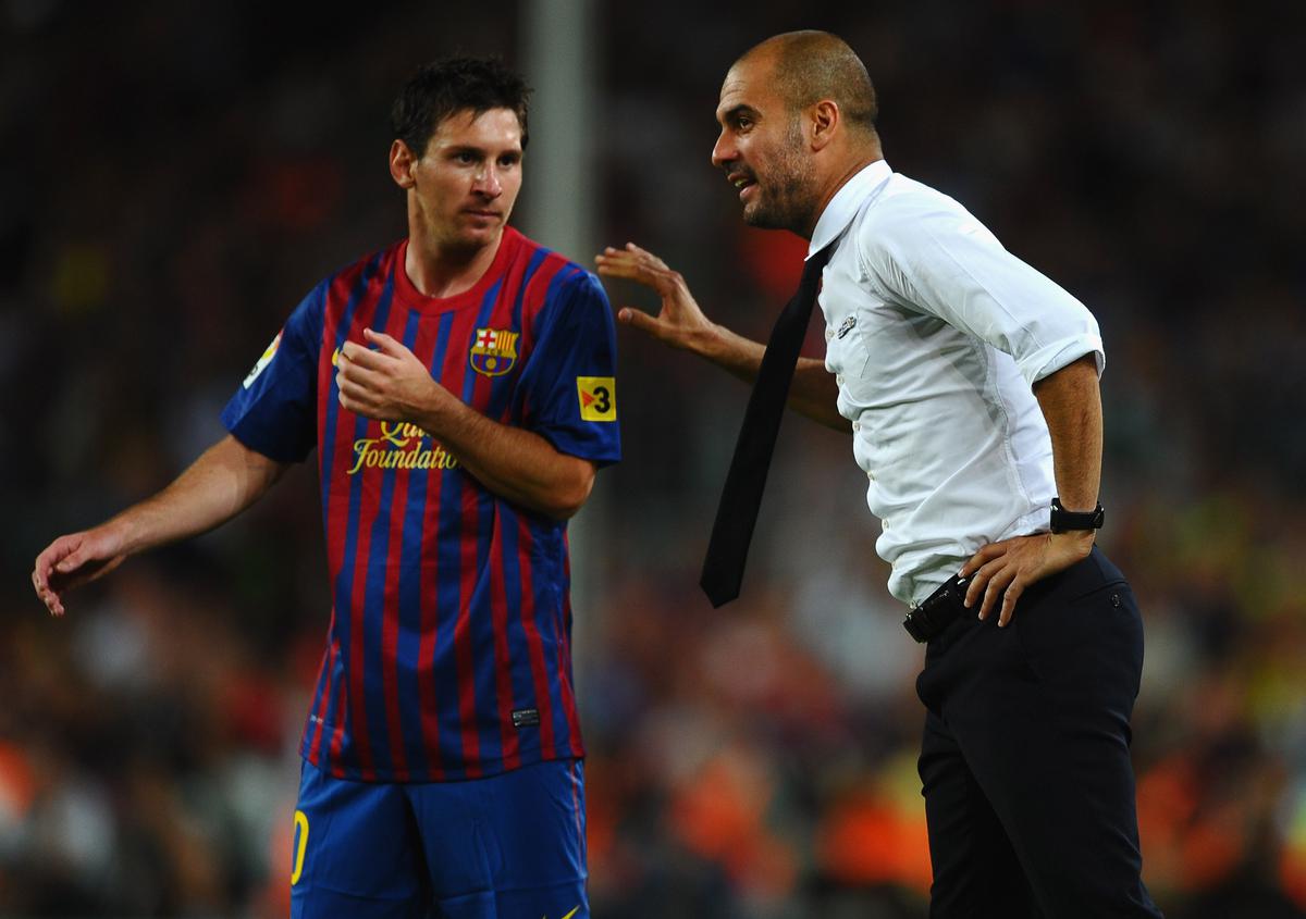 Lethal combination: Pep Guardiola of Barcelona talks with Lionel Messi during the Super Cup second leg match against Real Madrid at Nou Camp on August 17, 2011.