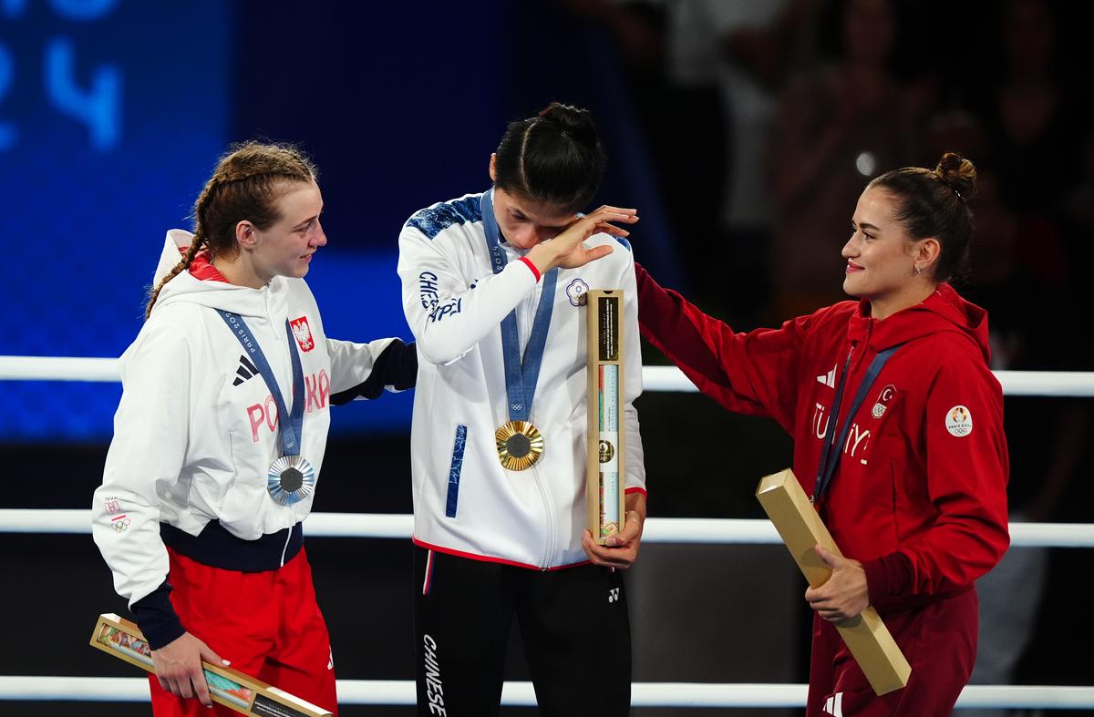 Lin, a two-time world champion, was overcome by emotion after the bout and moved to tears while standing on the podium.