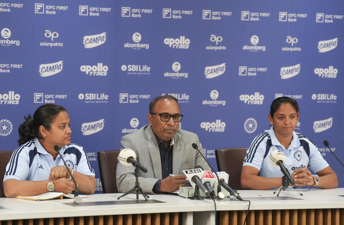 BCCI Secretary Devajit Sakia, centre, Chairperson of the selection panel Amita Sharma, left, and Indian captain Harmanpreet Kaur during a press conference.