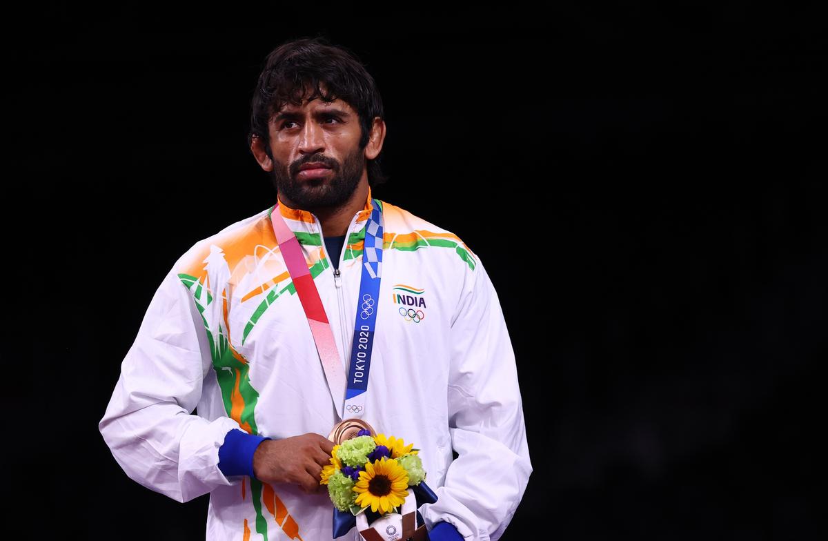 Bronze medallist Bajrang Punia of India poses for a photograph.